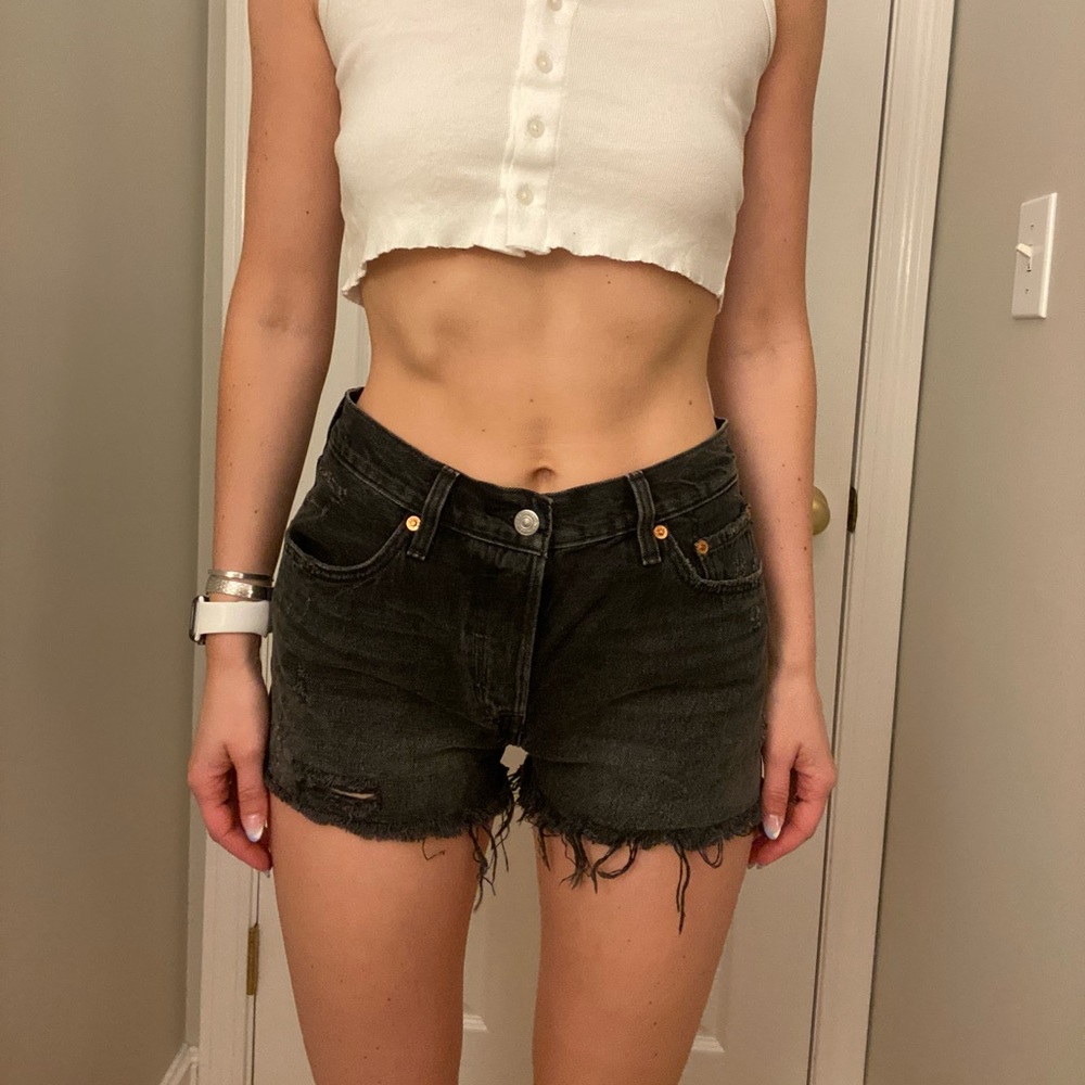 Vintage Black frayed Levi shorts , size 27
